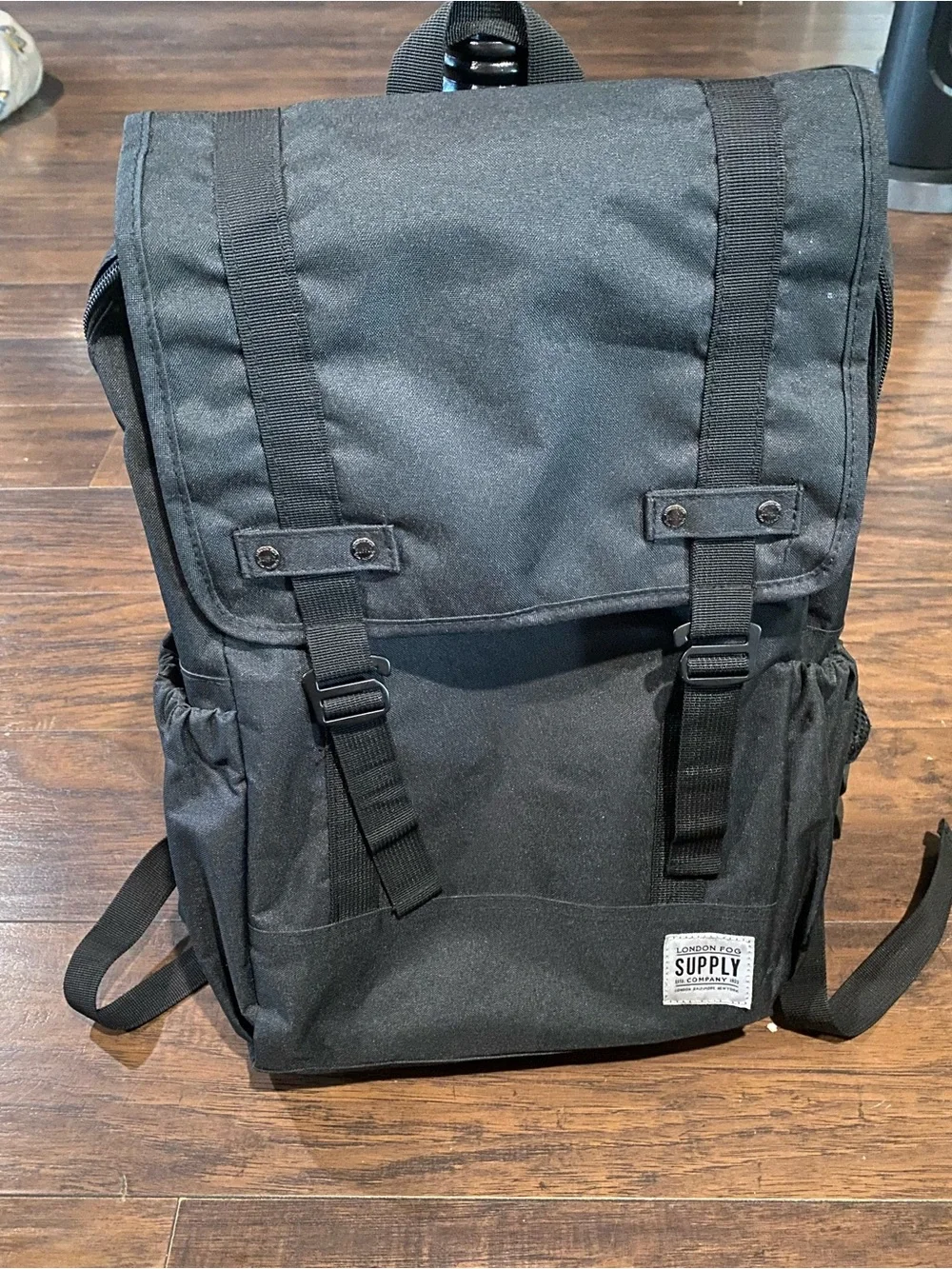 London Fog Black Canvas Flap Backpack with Buckle Straps